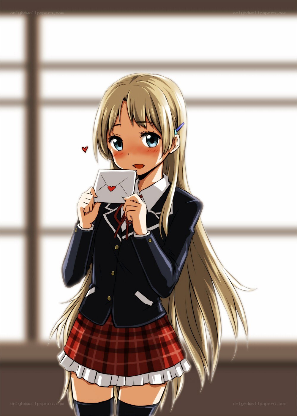 Blushing girl with letter