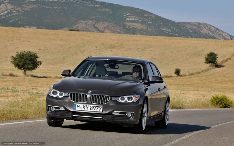 BMW 3 Series on a country road
