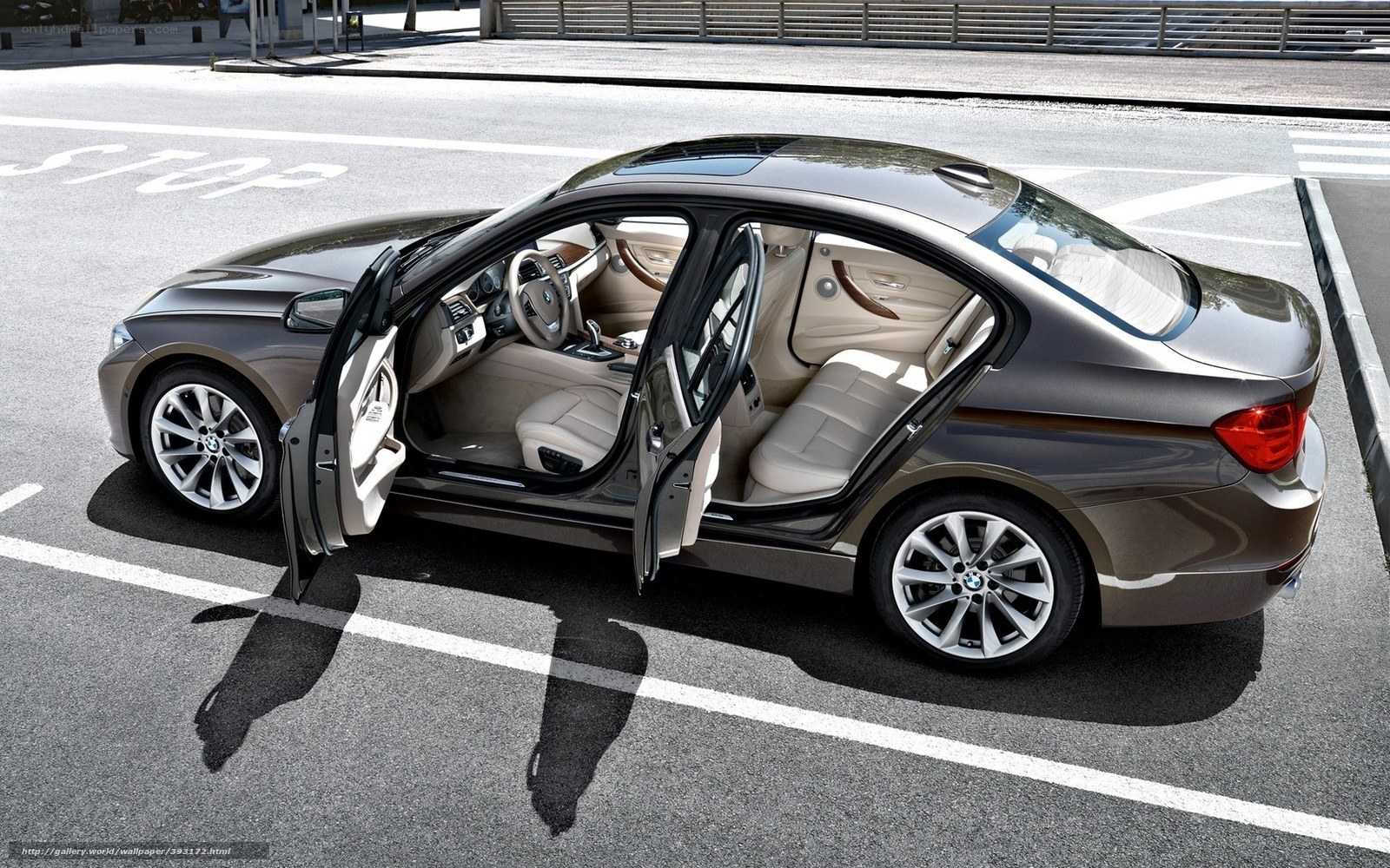 BMW 3 Series sedan with open doors