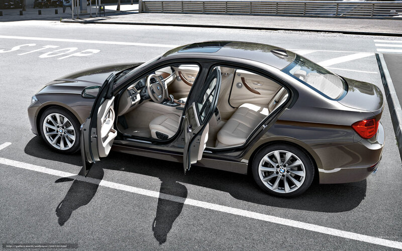 BMW 3 Series sedan with open doors
