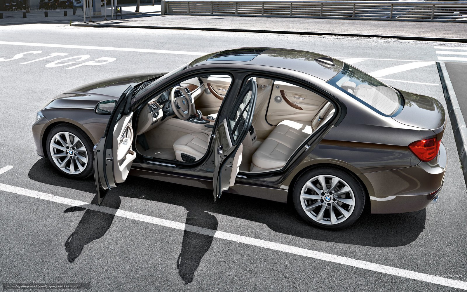 BMW 3 Series sedan with open doors