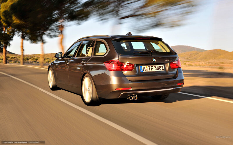 BMW 330d driving on a road