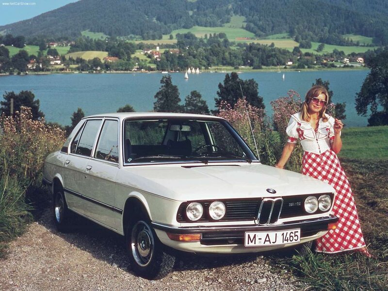 BMW 5-Series by a lake