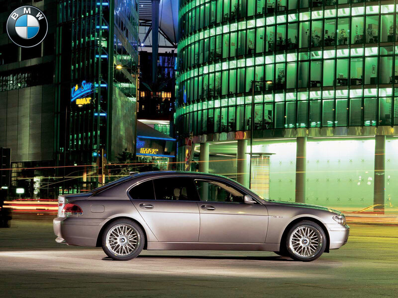 BMW 7 Series at night in city