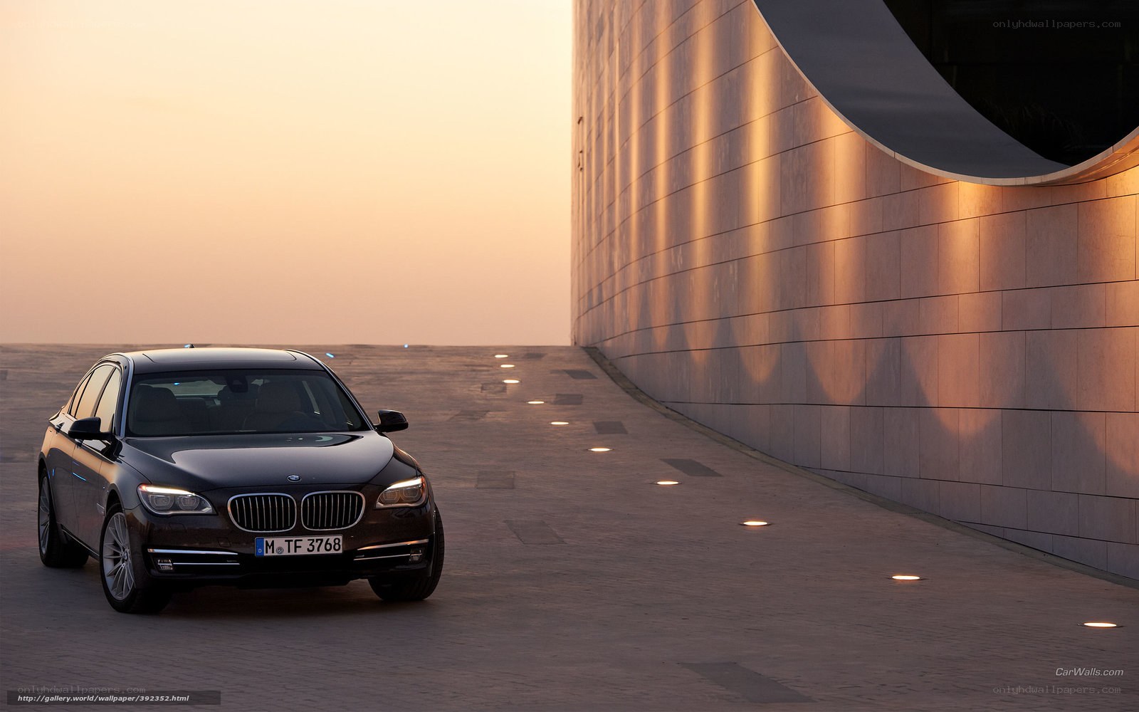 BMW 7 Series at sunset
