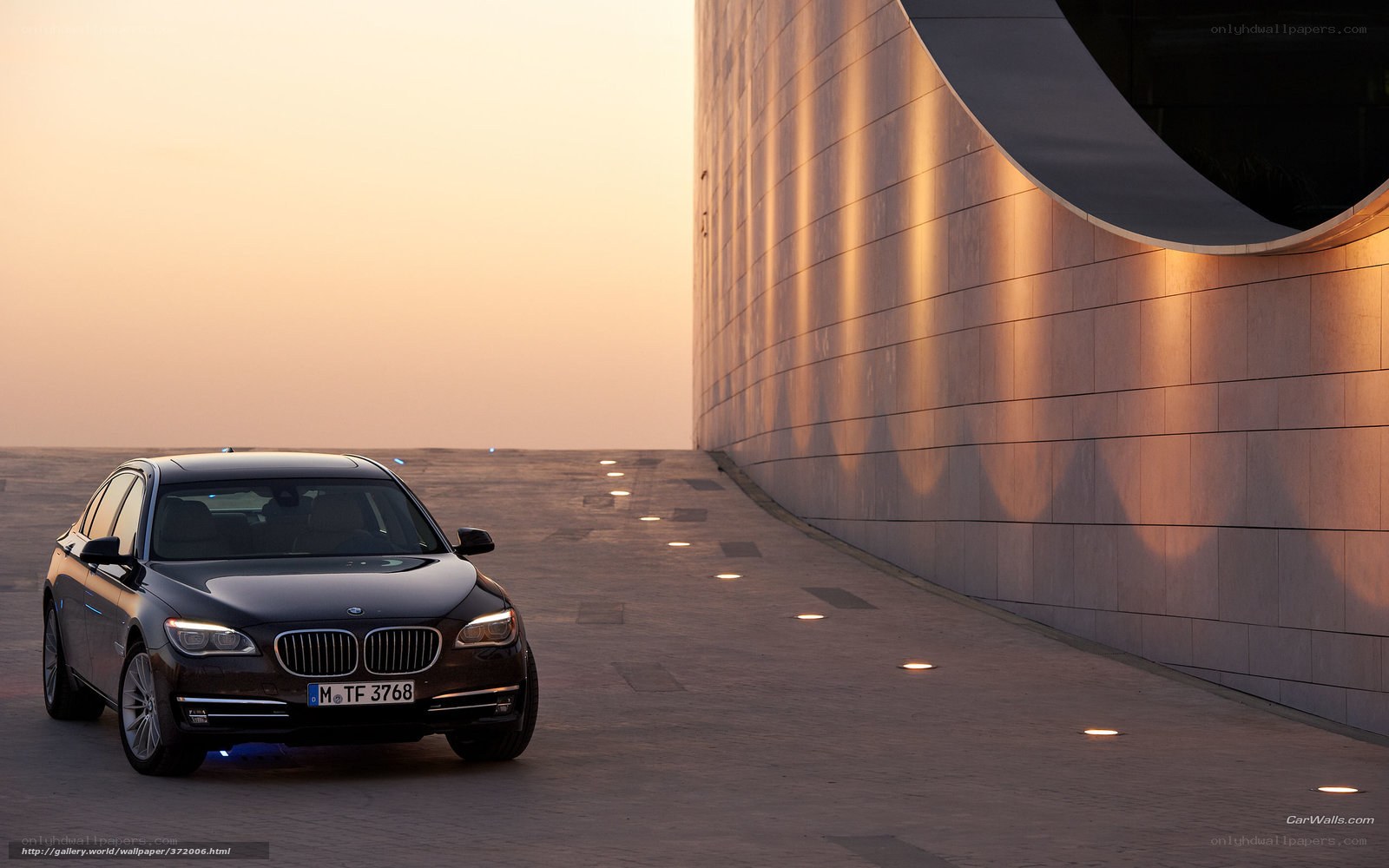 BMW 7 Series at sunset