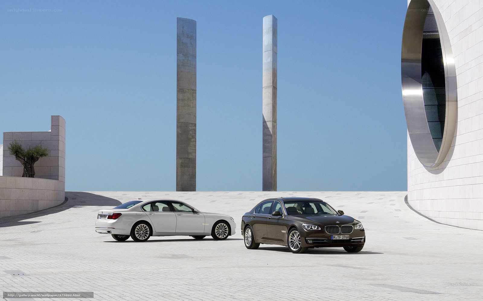 BMW 7 Series cars in modern setting