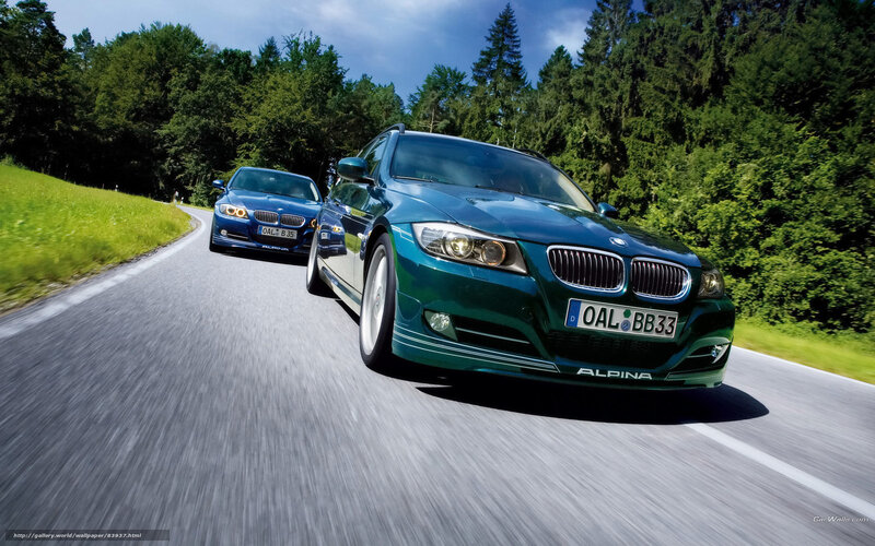 BMW Alpina cars on a forest road