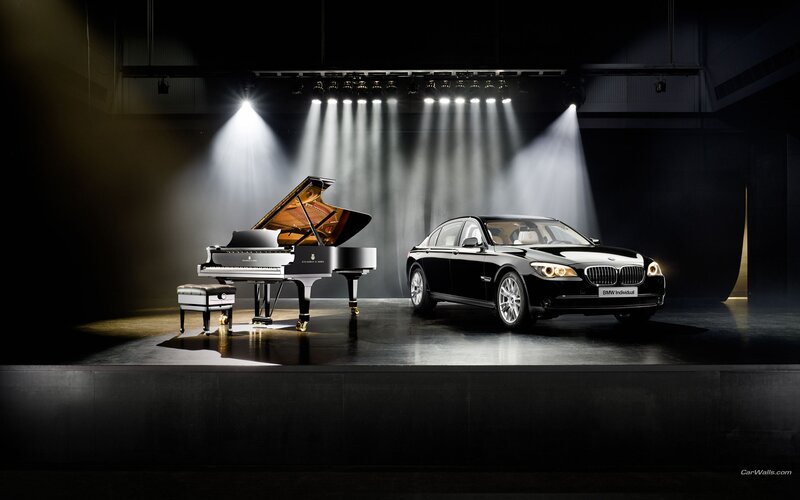 BMW and grand piano on stage