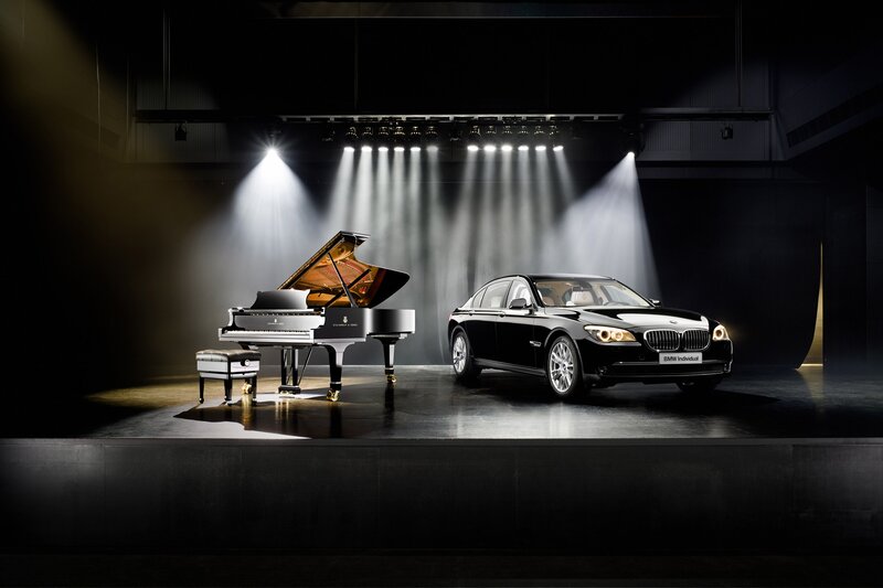 BMW and grand piano on stage