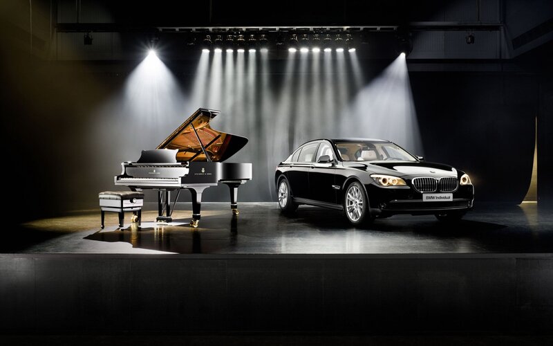 BMW and grand piano on stage