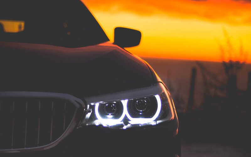 BMW Car Front View — Black, Dramatic, Sunset