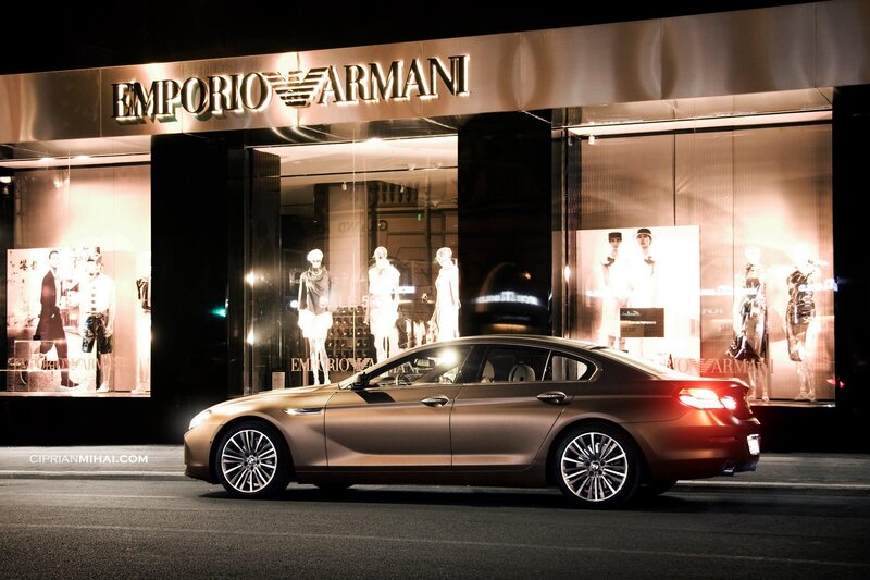 BMW car in front of Emporio Armani