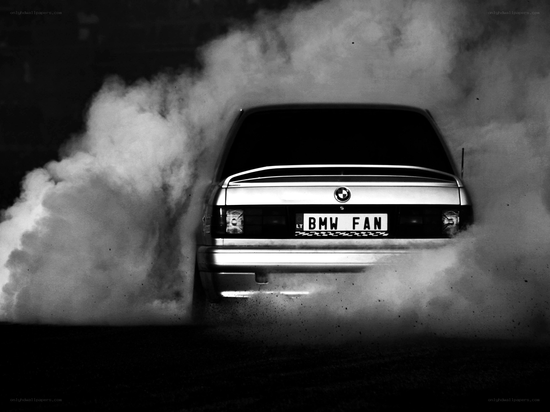 BMW car performing burnout