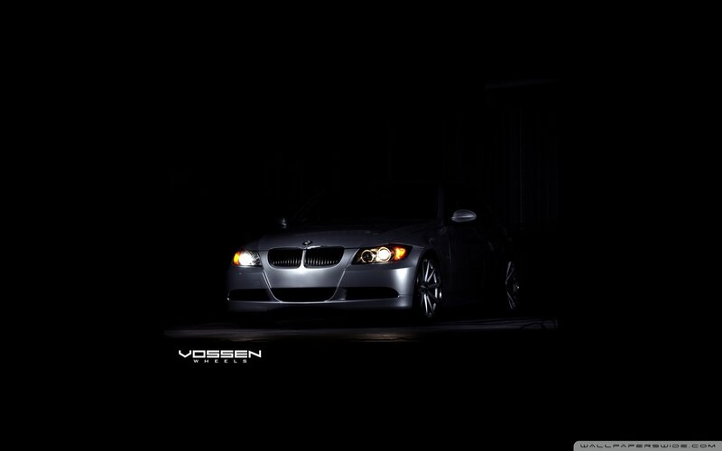 BMW car with headlights on
