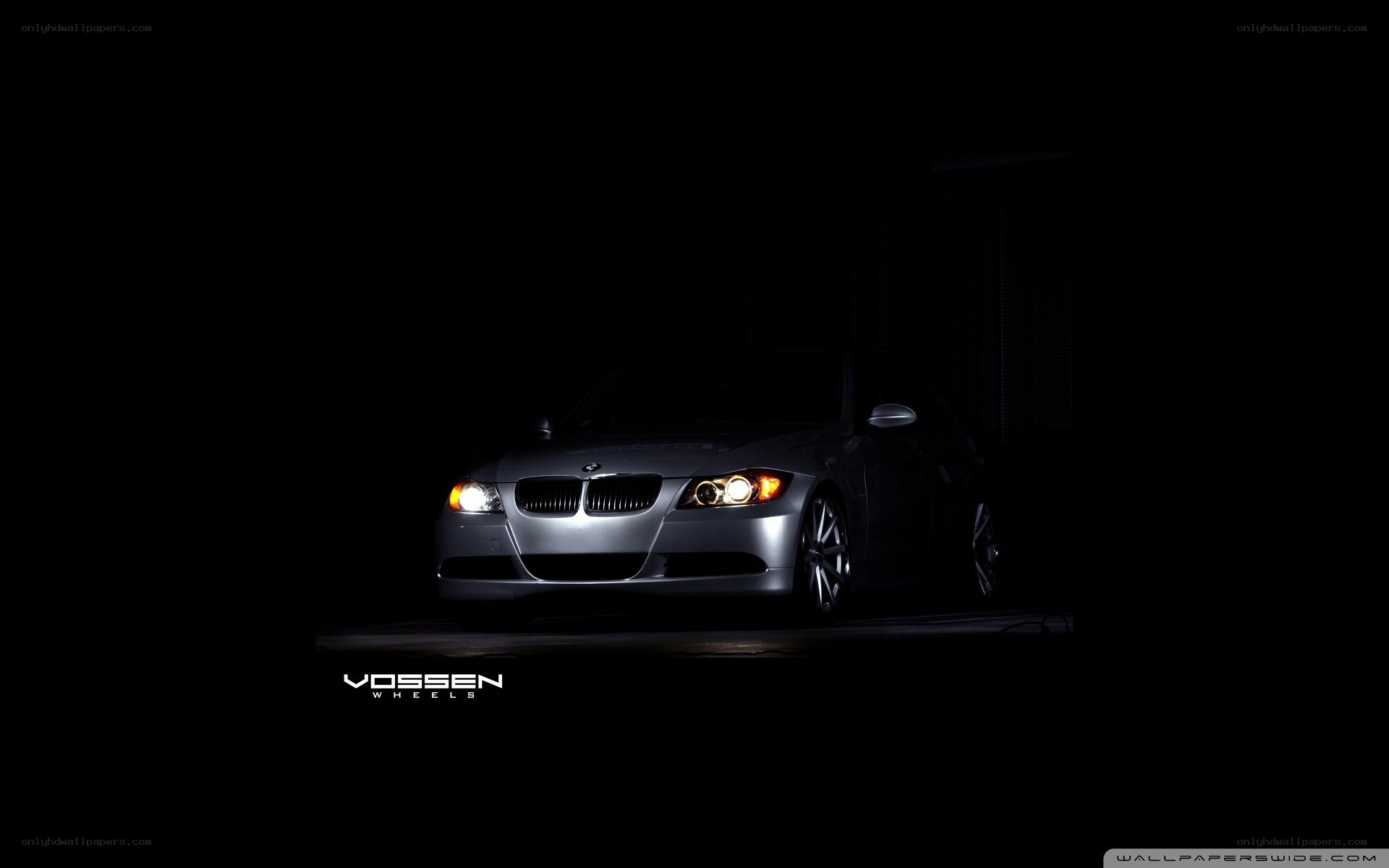 BMW car with headlights on