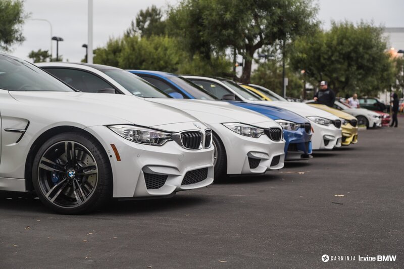 BMW Cars in a Row — White