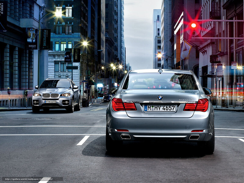 BMW cars in city street