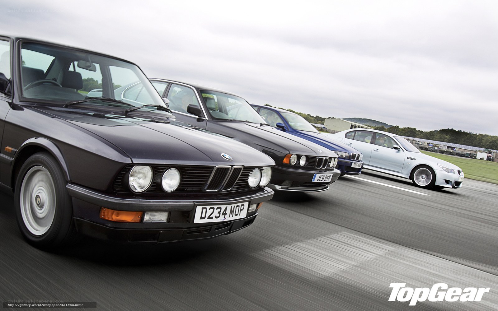 BMW cars on a racetrack