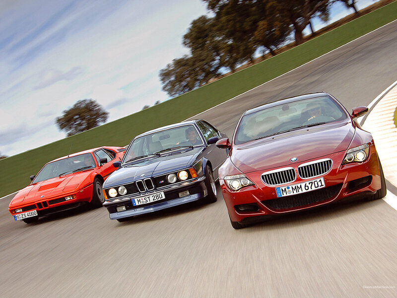 BMW cars on a racetrack
