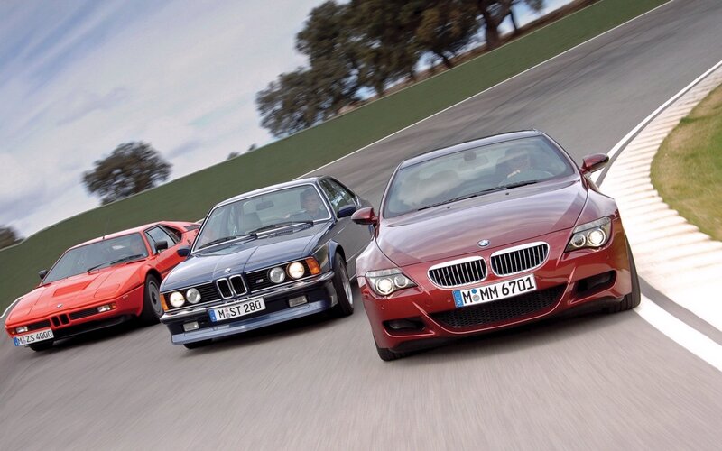 BMW cars on a racetrack
