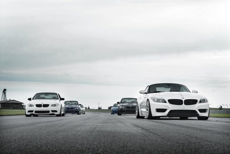 BMW cars on a racetrack