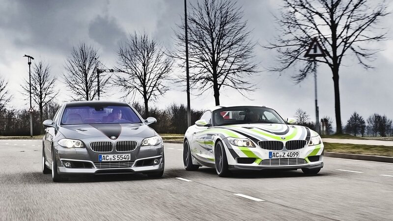 BMW cars on a road