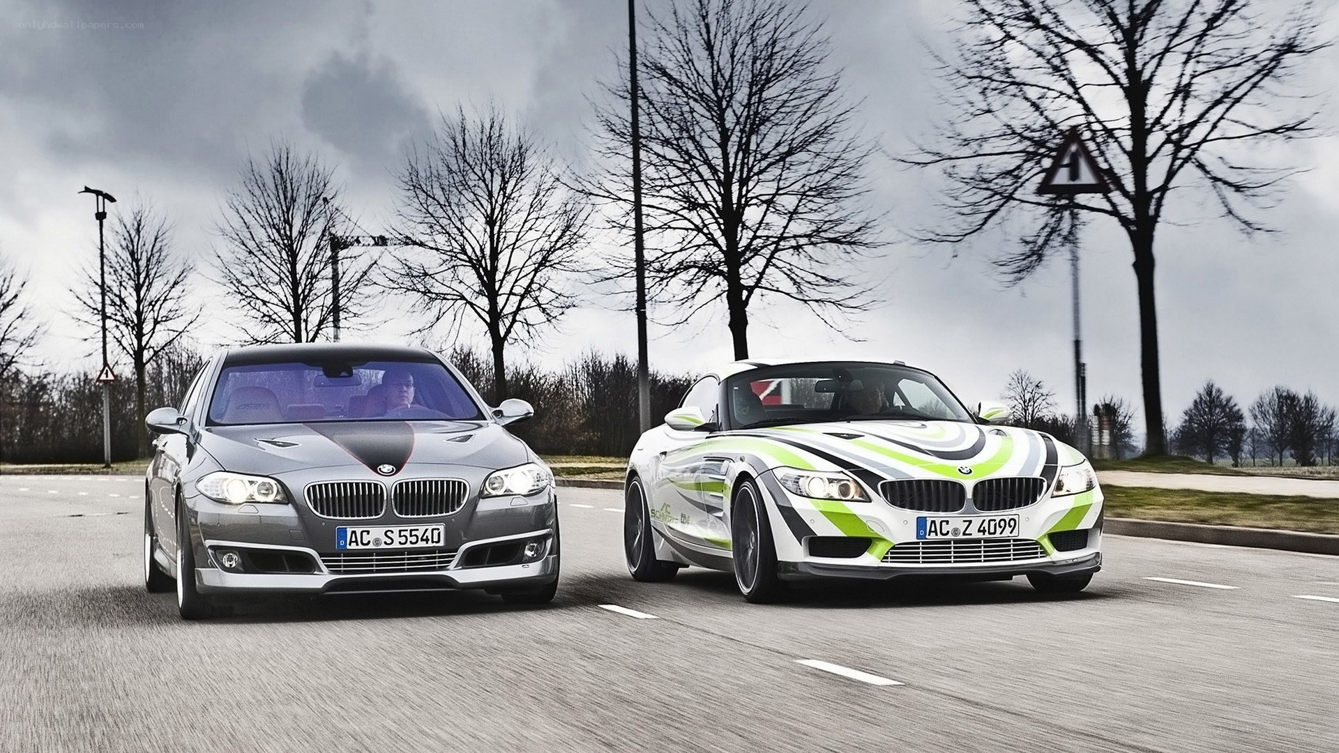 BMW cars on a road