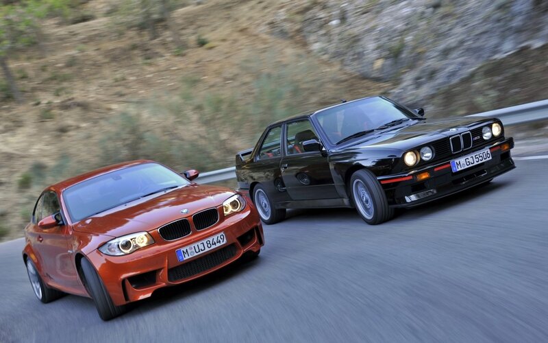 BMW cars on a winding road