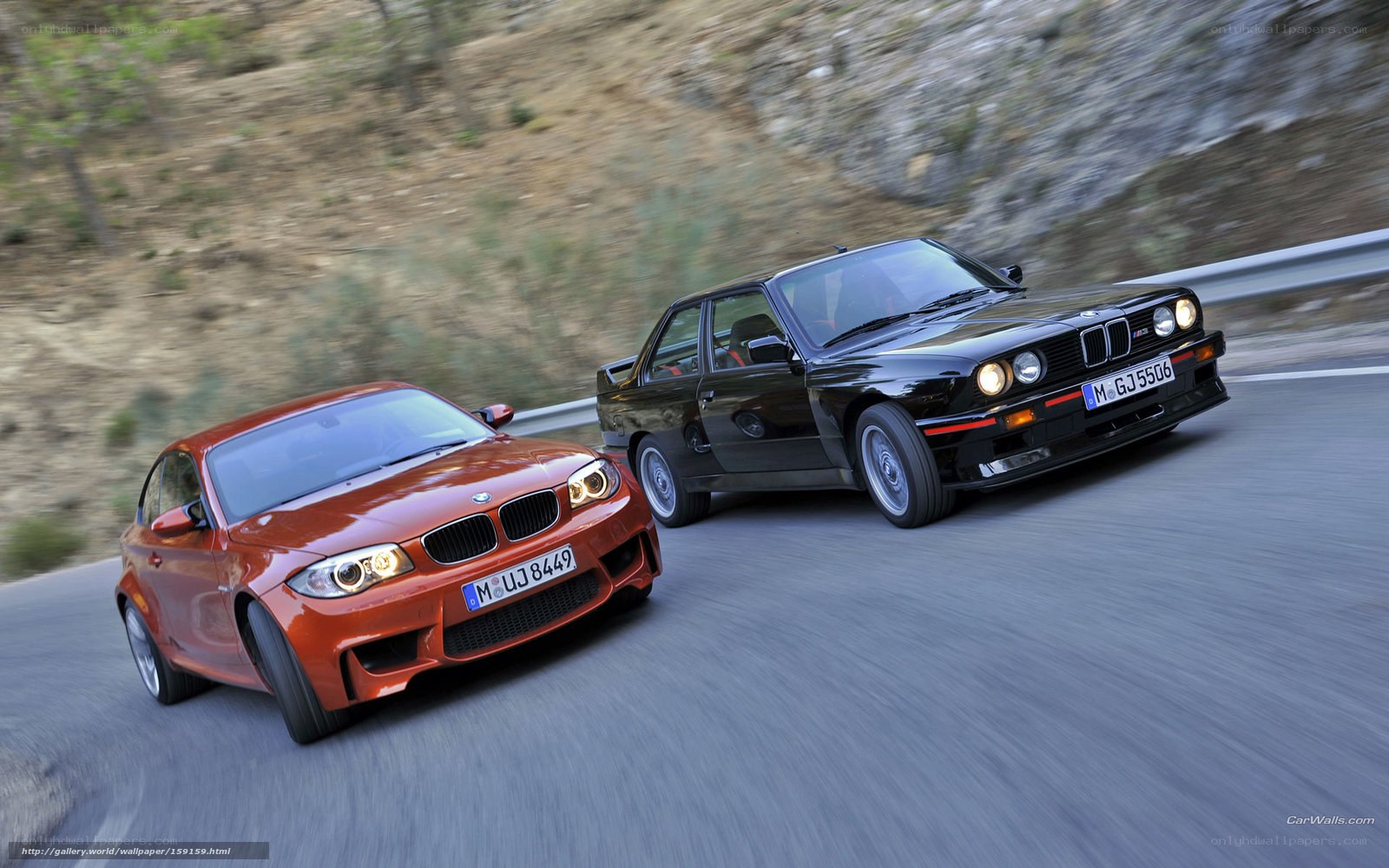 BMW cars on a winding road