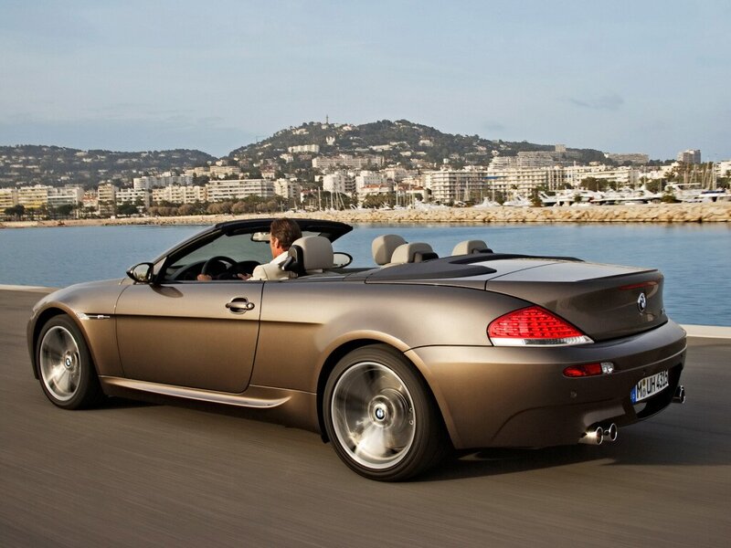 BMW convertible on coastal road