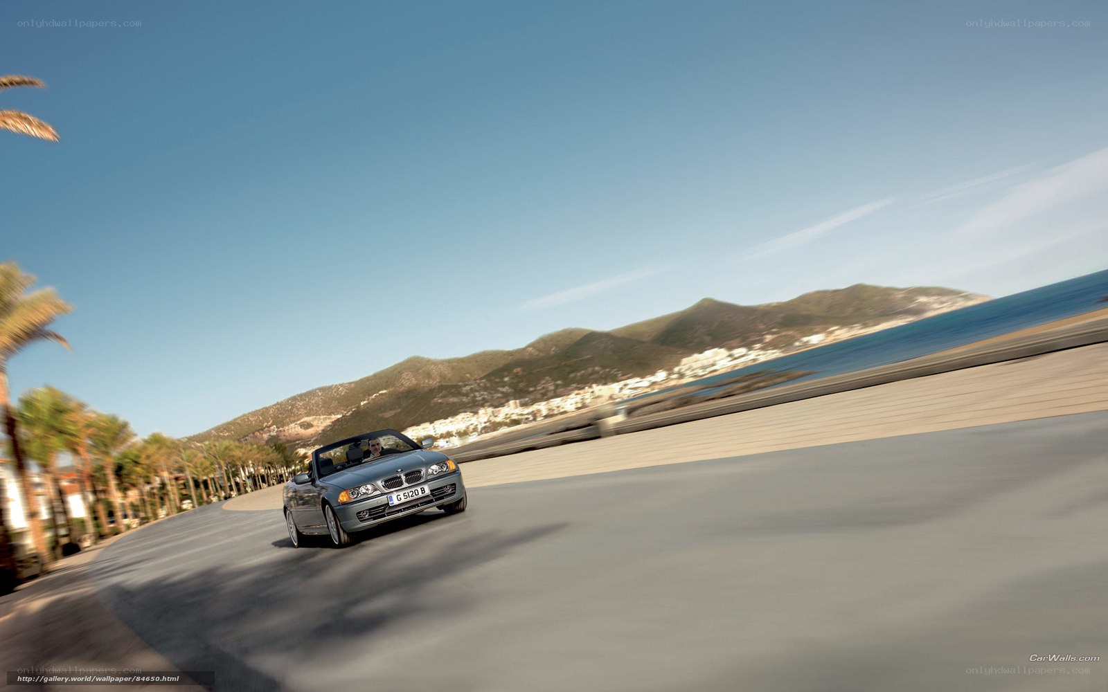BMW convertible on coastal road