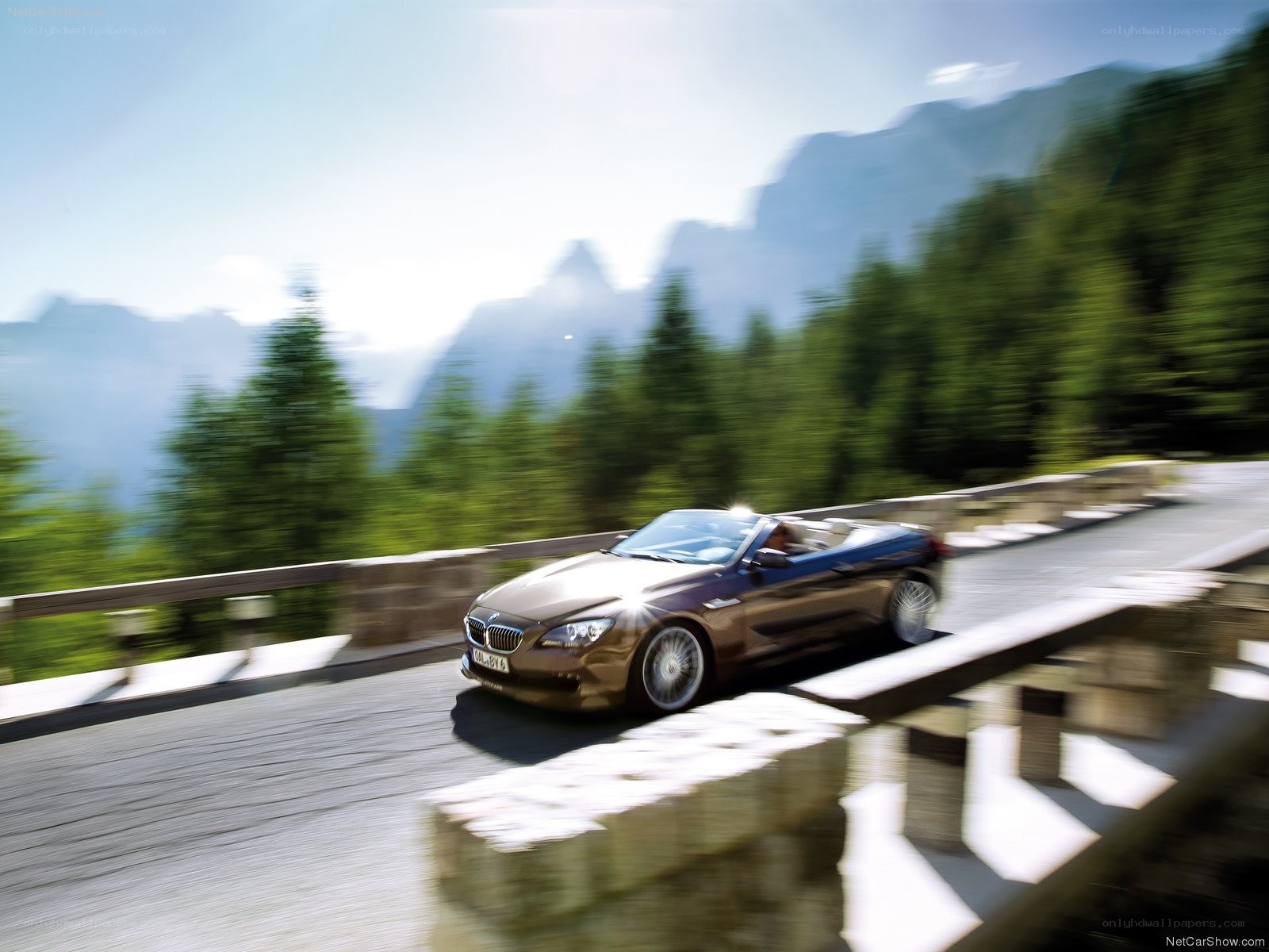 BMW convertible on mountain road