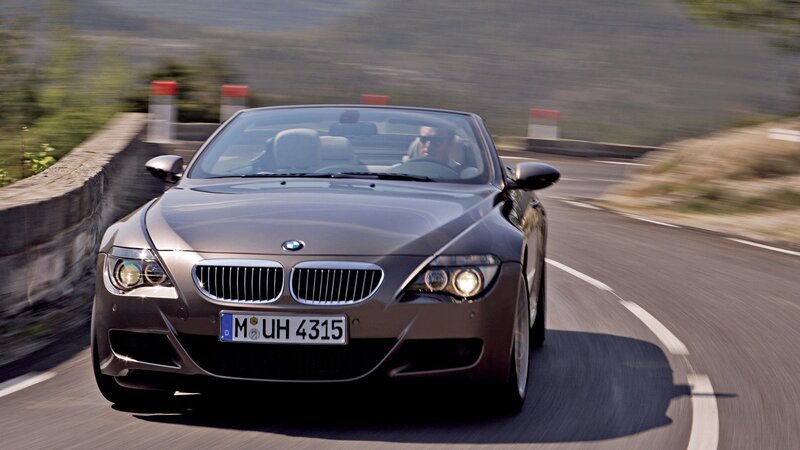 BMW convertible on winding road