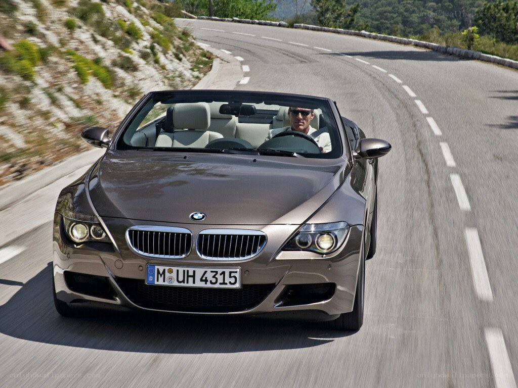 BMW convertible on winding road
