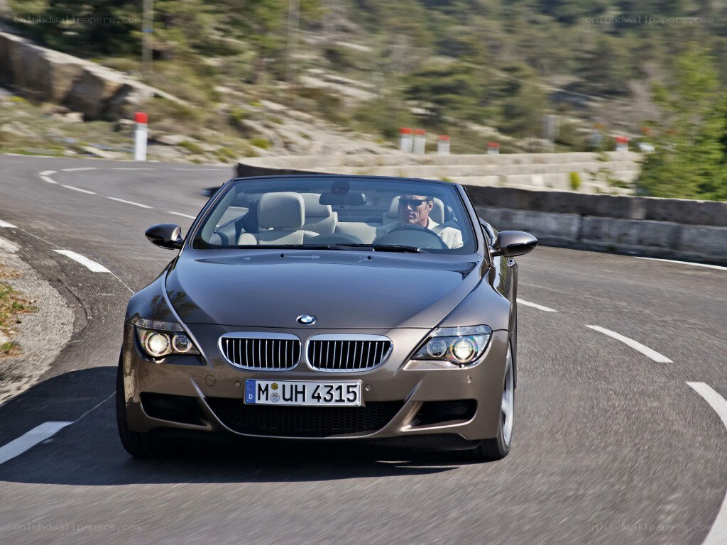 BMW convertible on winding road