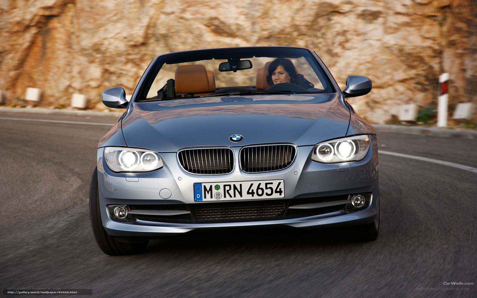 BMW convertible on winding road