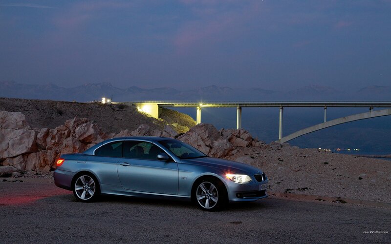 BMW coupe on coastal road