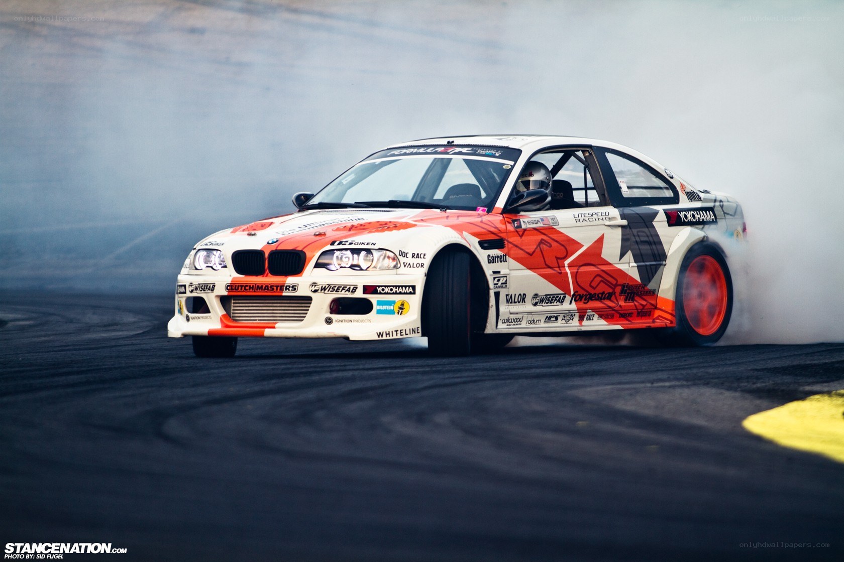 BMW drifts on racetrack