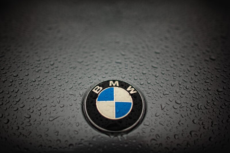 BMW emblem on wet surface