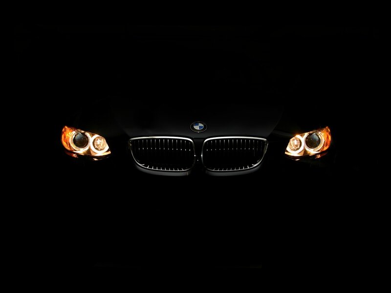 BMW headlights in darkness