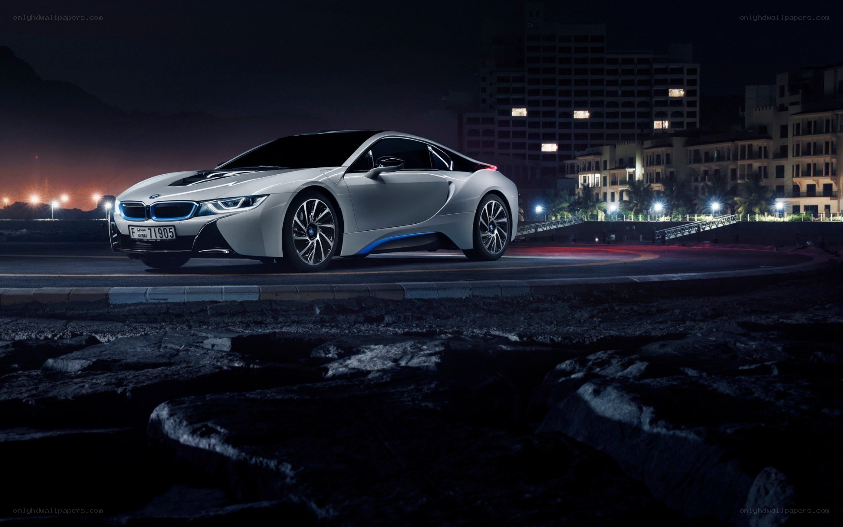 BMW i8 at night by the coast