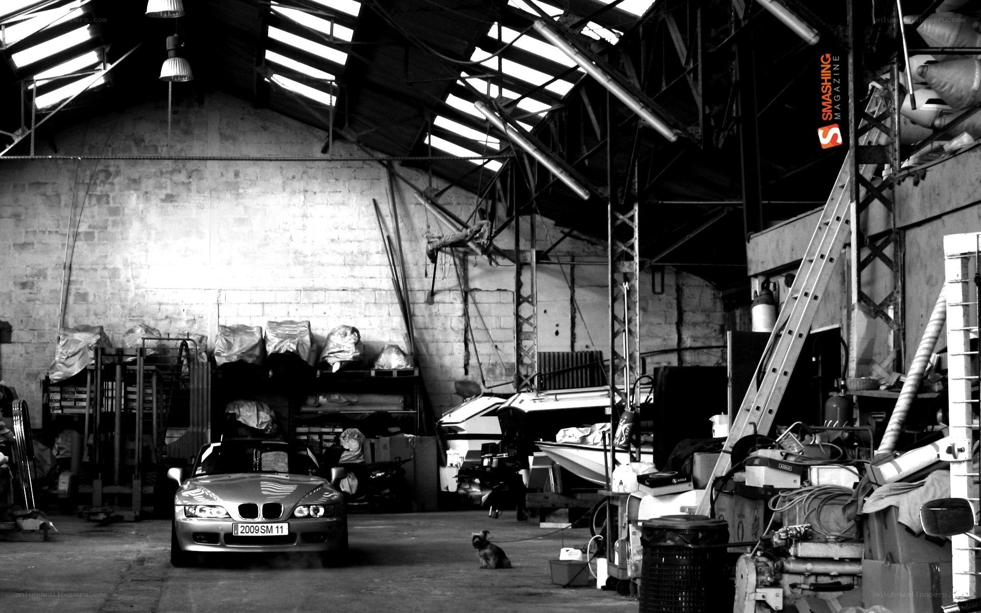 BMW in a cluttered garage