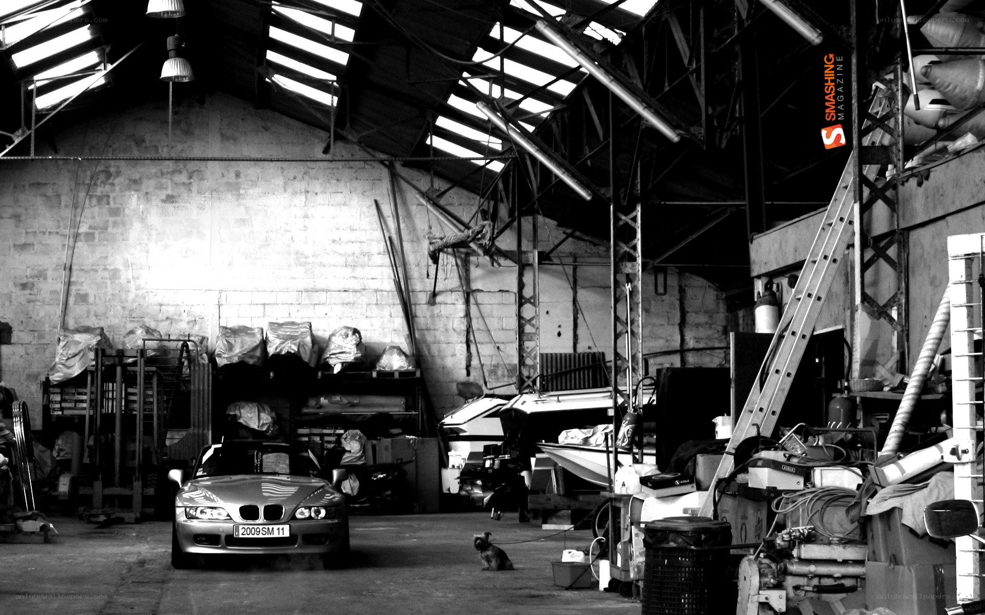 BMW in a cluttered garage