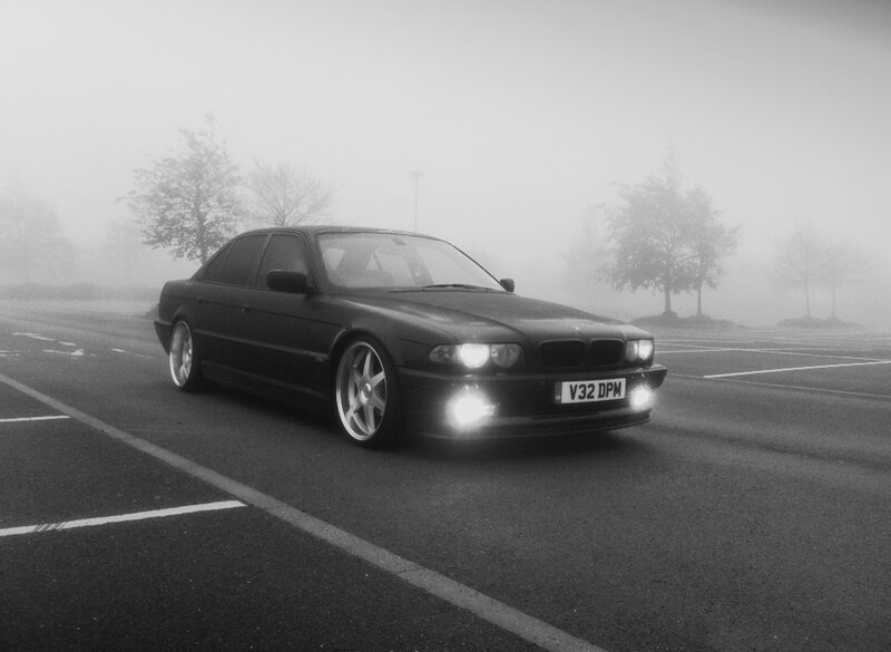 BMW in foggy parking lot