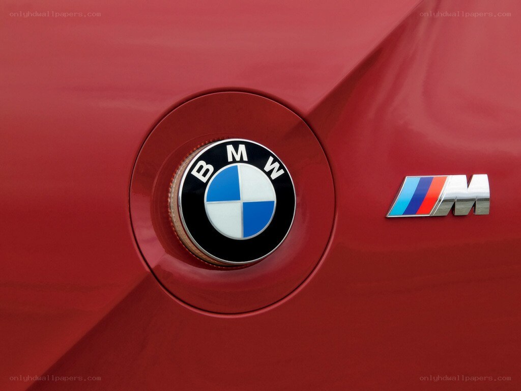 BMW M logo on red car