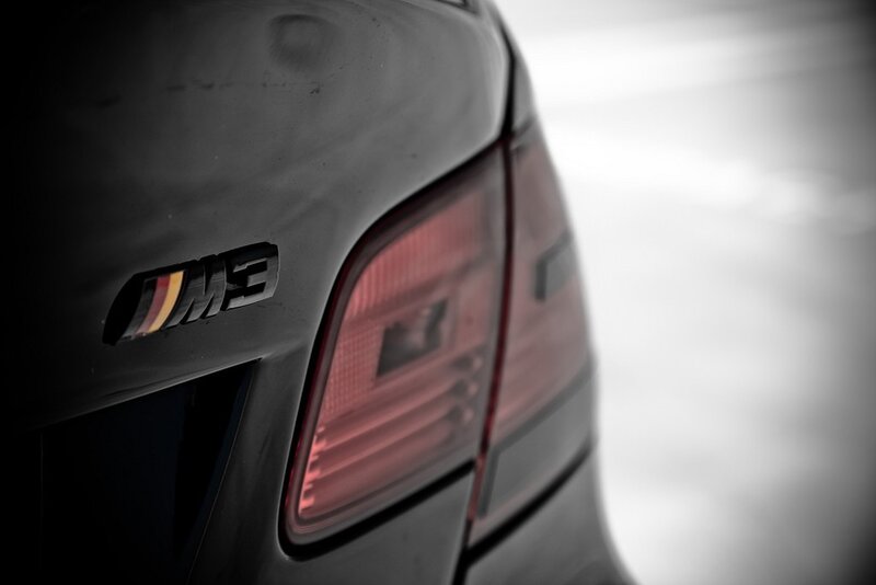 BMW M3 Badge — Black, Dramatic, Photograph