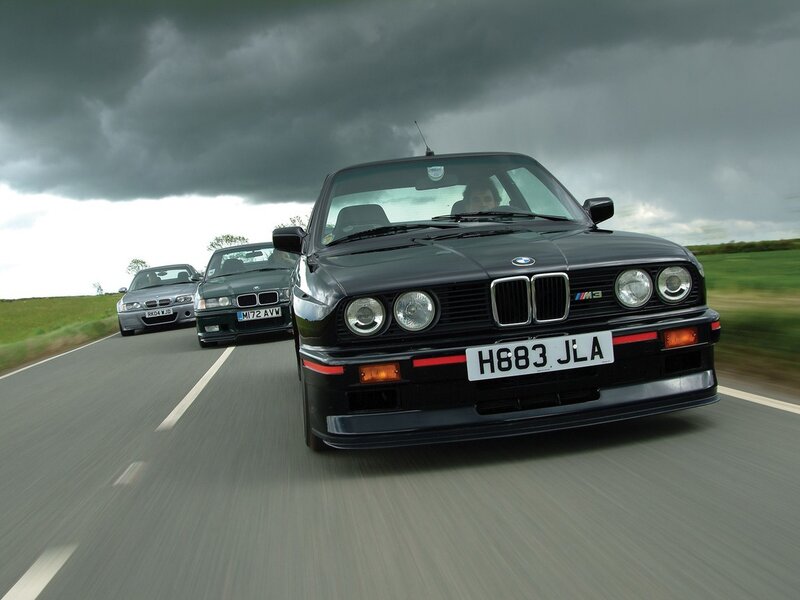 BMW M3 cars on a road