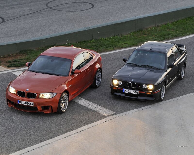 BMW M3 cars on racetrack