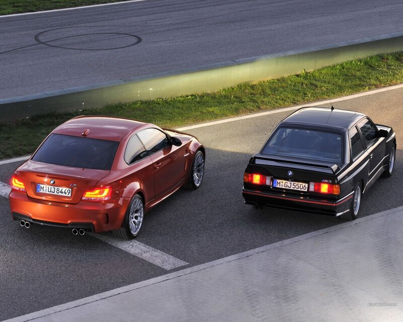 BMW M3 cars on racetrack